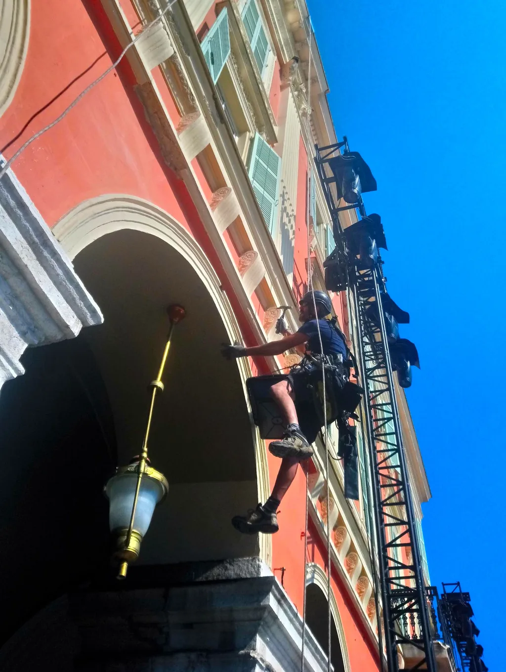 Rope access technicians renovating a facade, Place Masséna, Nice