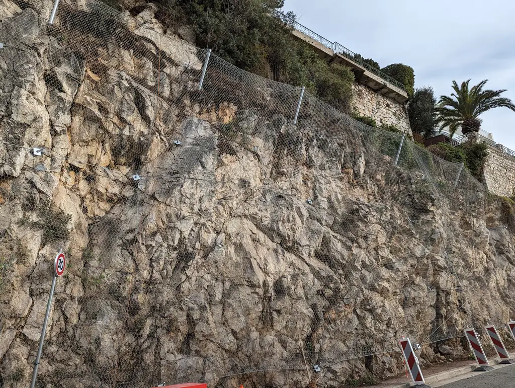 Stabilised rock face above a road