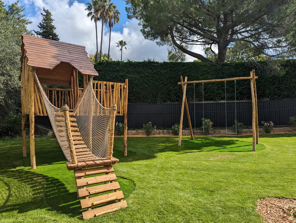 Wooden treehouse with a swing, Mougins