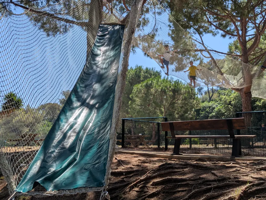 Slide inside a suspended net